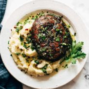 Portobello mushroom on a bed of mashed potato.