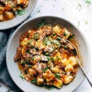 Short Rib Ragu in bowls with fork.