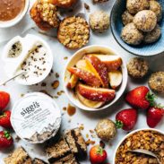 Snacks on a table with Siggi's yogurt.