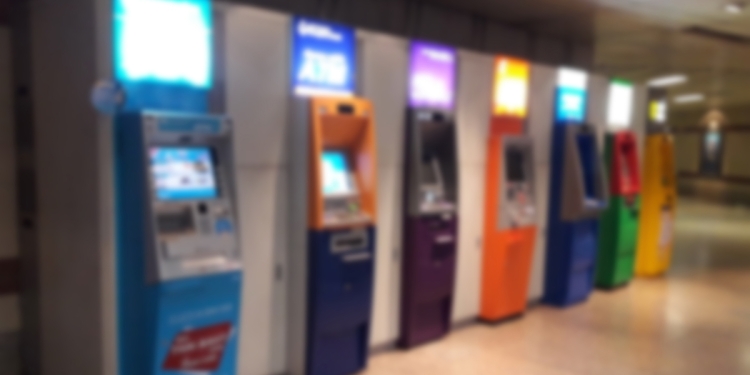 Row of ATMs in a hallway, blurred, concept picture