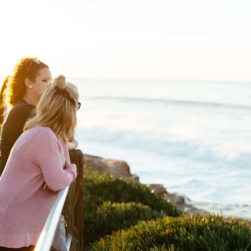 Lindsay's friends look at the Pacific Ocean.