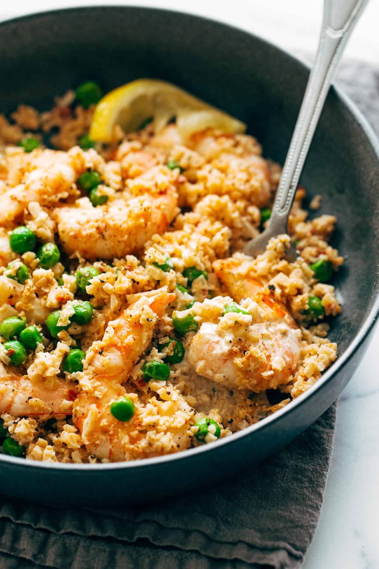 Close up of the shrimp and cauliflower rice in a bowl.