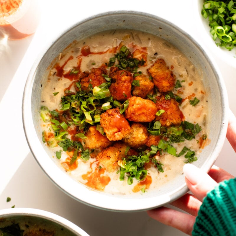 A picture of Spicy White Chicken Soup with Seasoned Tots